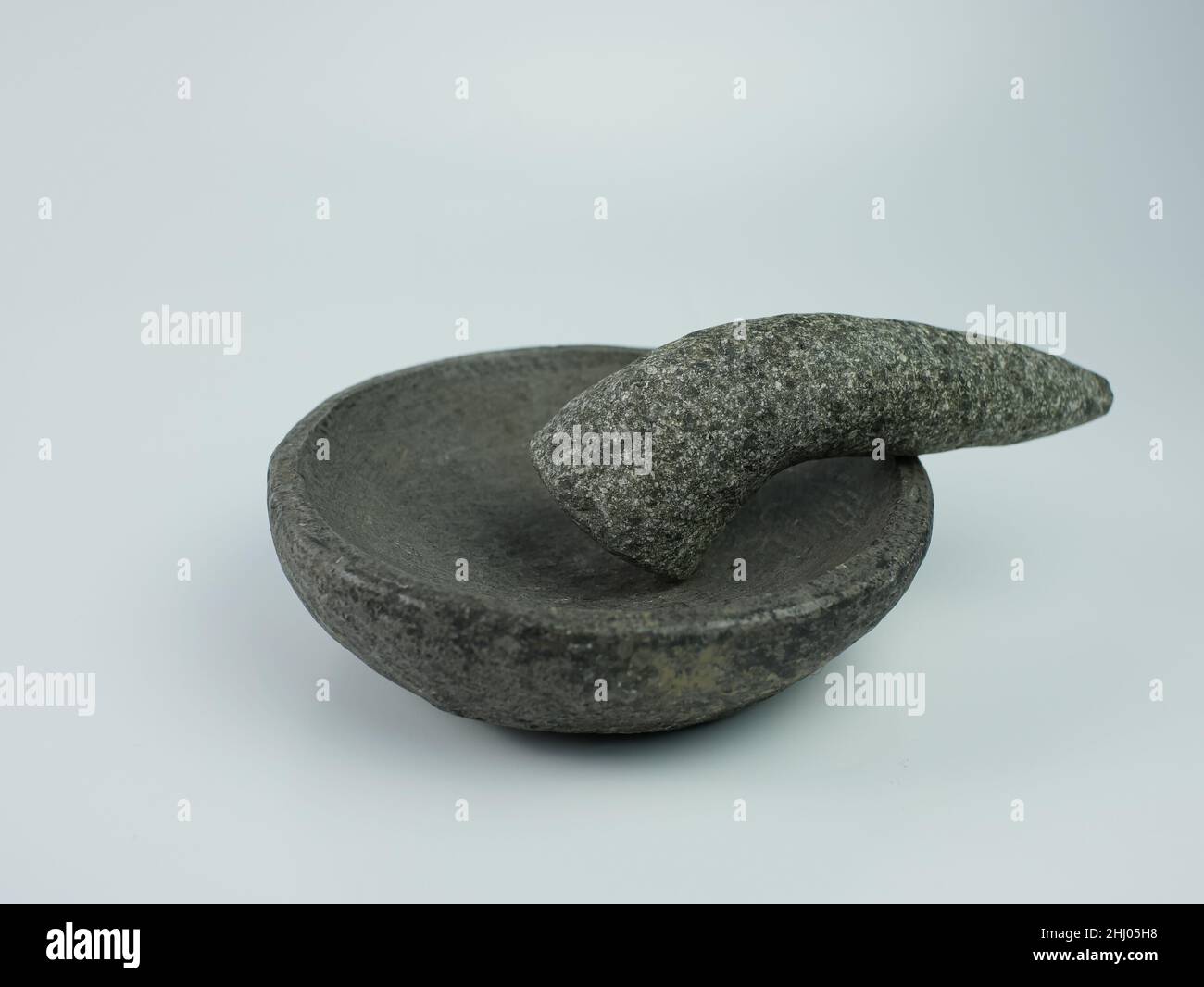 Indonesian traditional mortar and pestle isolated on a white background