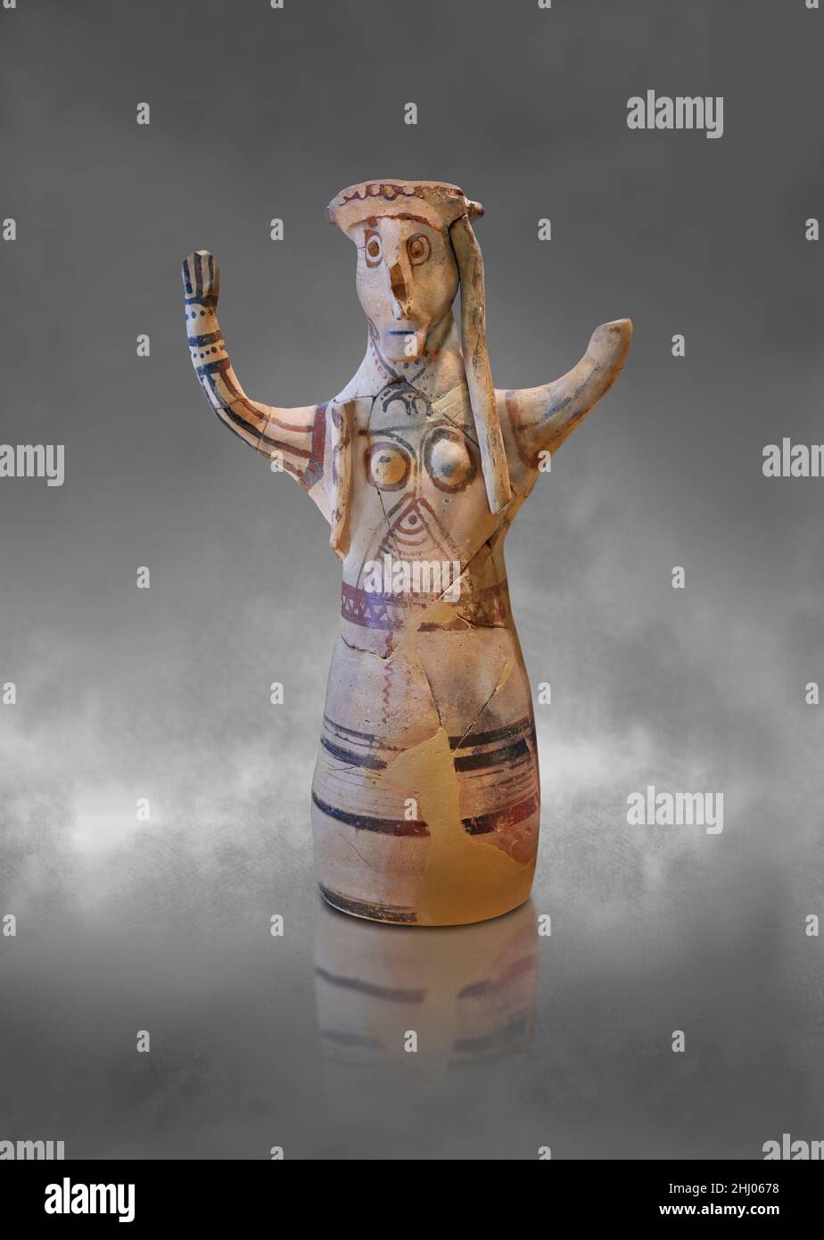 Mycenaean pottery figurine statuette of a goddess made on a pottery wheel, Tiryns Lower Citadel, 12th cent BC. . Against grey art background. Photogra Stock Photo