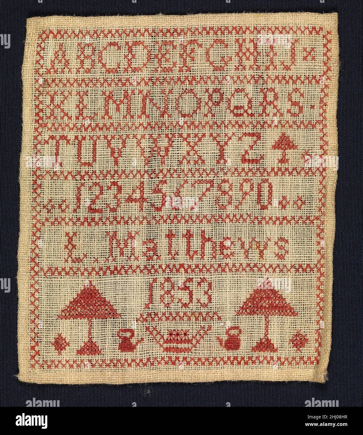 Sampler made at a charity school 1853 L. Matthews The earliest British charity schools for poor and orphaned children were founded around the country by local gentry to support and educate children whose families lived in the vicinity. In the eighteenth century, the number of institutions increased significantly. Arguably the most famous of these is the Foundling Hospital in London established by Thomas Coram in 1741; the charity still exists today as the Thomas Coram Foundation for Children. This sampler was probably made to be included in a book of stitching exercises.. Sampler made at a cha Stock Photo