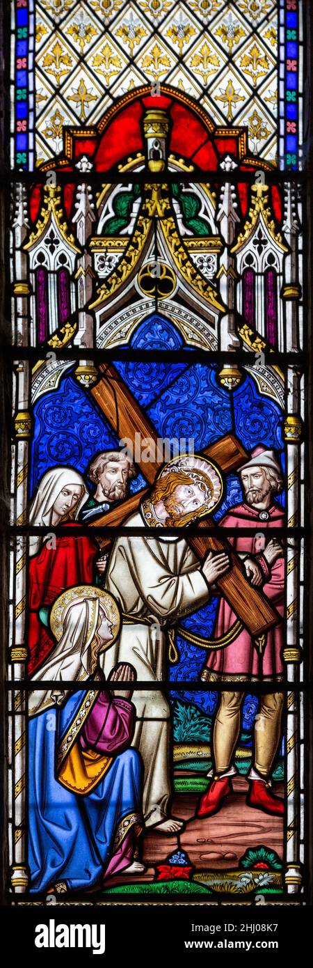 Stained glass window by William Wailes c 1860, Thrandeston church, Suffolk, England, UK - Carrying Cross Stock Photo