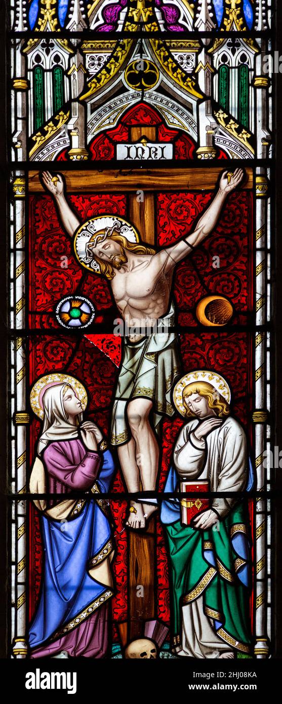 Stained glass window by William Wailes c 1860, Thrandeston church, Suffolk, England, UK - Crucifixion Stock Photo