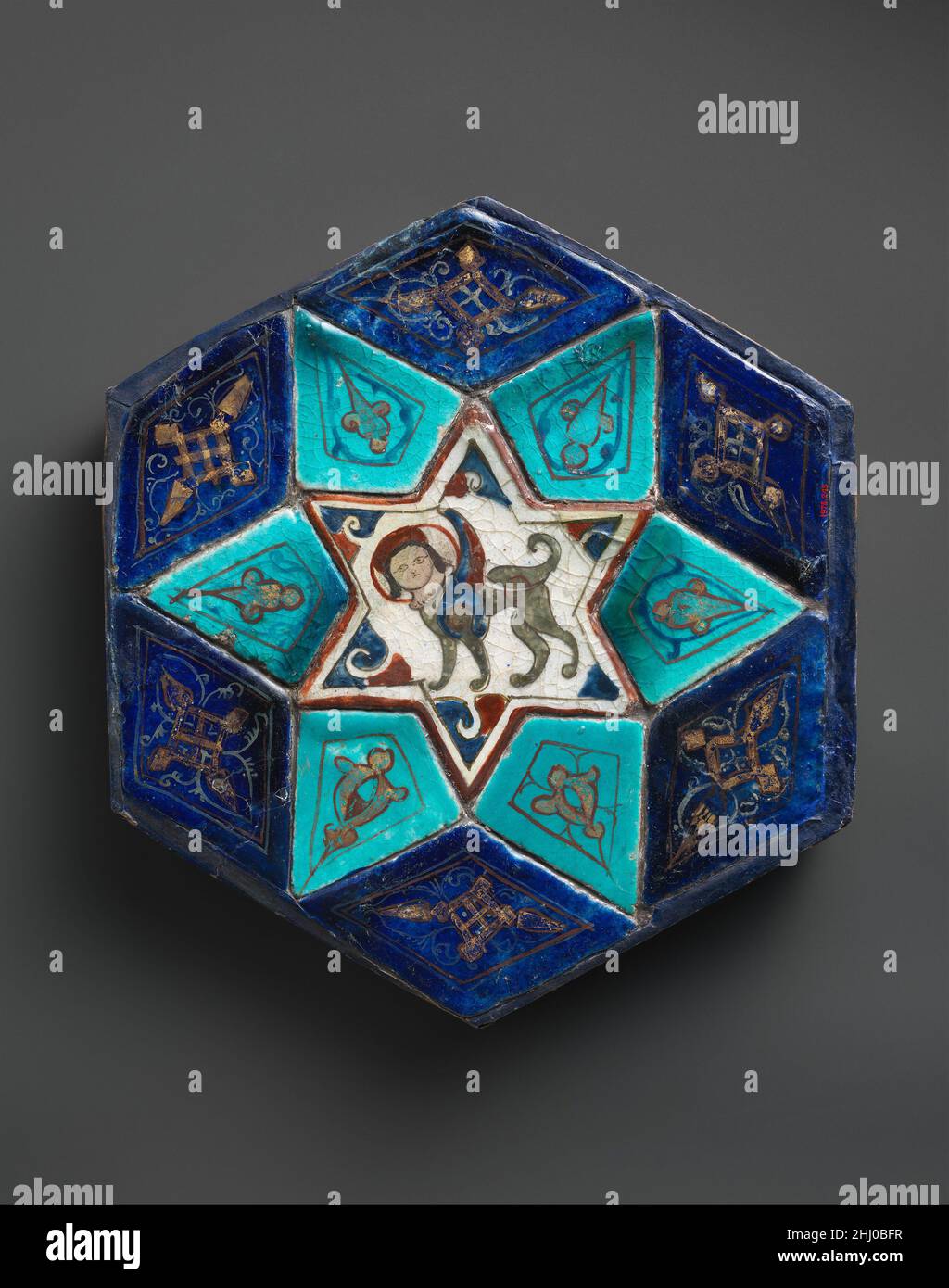 Hexagonal Tile Ensemble with Sphinx ca. 1160s–70s By the early twentieth century, the two-story Konya Köşk had largely fallen into ruin, but architectural fragments speak to its former artistic sophistication and lavish polychrome ornamentation. The upper story of this Rum Seljuq “citadel-palace” was dominated by an iwan with balconies on three sides facing outward over the sultanate’s capital, Konya, thereby functioning as both a belvedere and a point from which the sultan could consider his dominion. The luxurious mina˒i ceramic technique of these tiles is reminiscent of that associated with Stock Photo