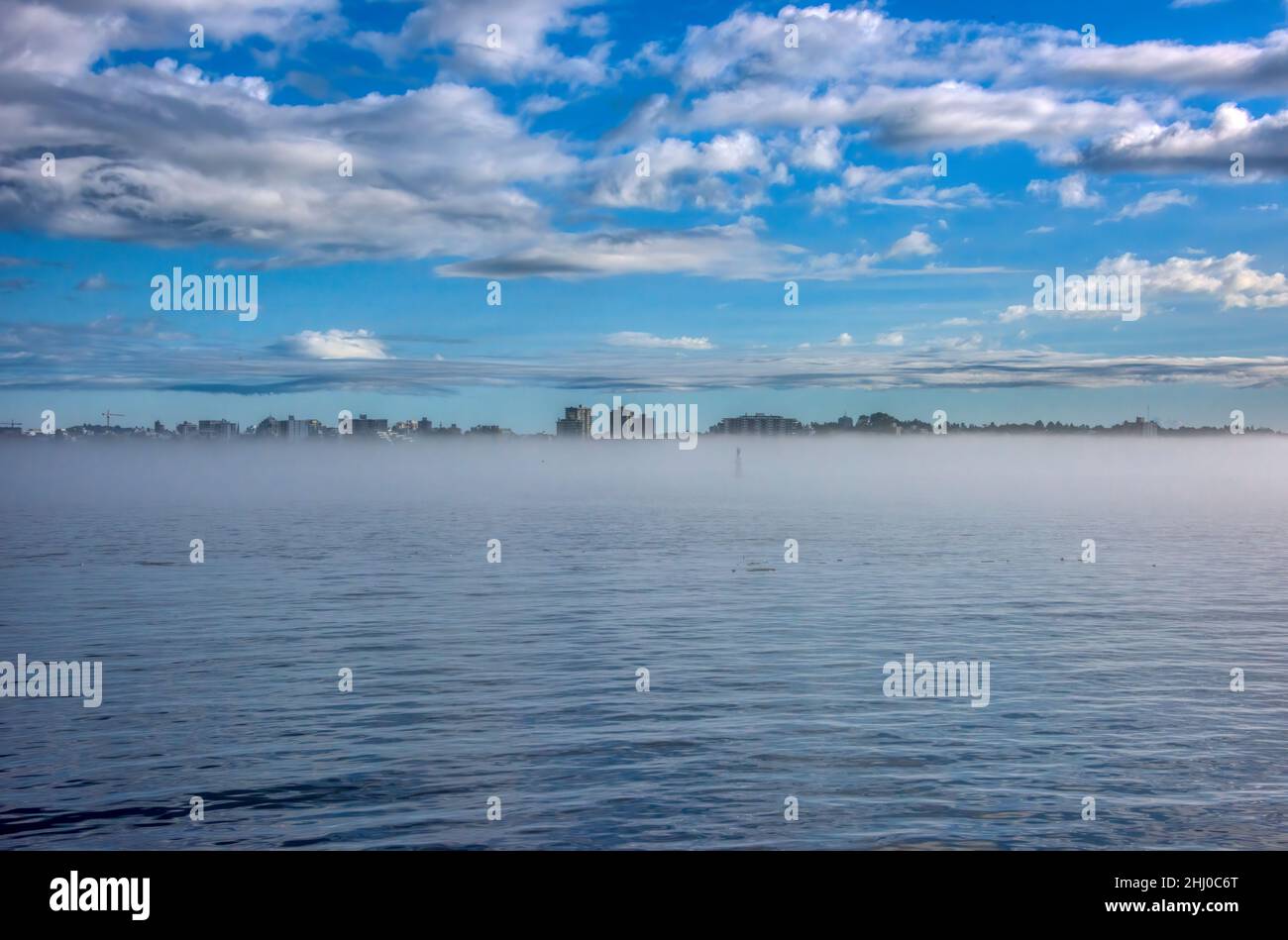 A Massive Fogbank Hinders View of Victoria, BC From Port Angeles Ferry Stock Photo