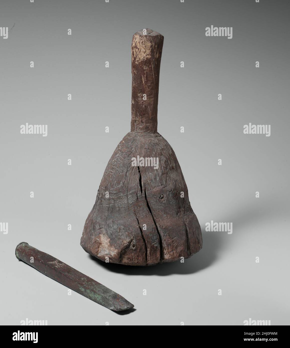 Stone Mason's Chisel ca. 2051–2000 B.C. Middle Kingdom This chisel was clearly made for use and looks as if it has indeed been used. It was found in a tomb that contained at least six burials but no object of demonstrably post-Mentuhotep II date. There was even a piece of linen marked for Mentuhotep II's wife Queen Neferu. The mark incised into the chisel was previously understood to represent the pyramid which Museum excavator Herbert E. Winlock and others thought had originally existed above the solid core structure of the temple of Mentuhotep II at Deir el-Bahri. The existence of this pyram Stock Photo