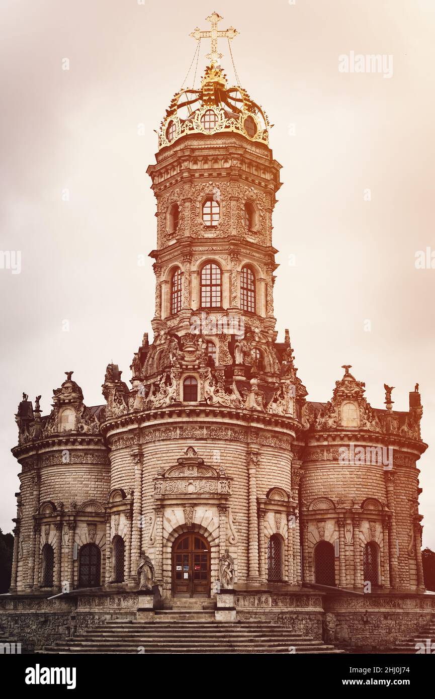 Russia, Dubrovitsy 06.29.2021 exterior of the Orthodox building church Sign of the Most Holy Theotokos temple of Gothic architecture. gloomy view of t Stock Photo