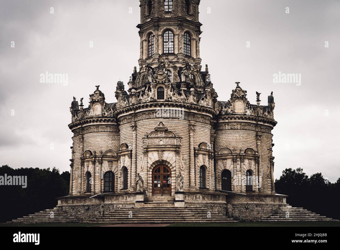 Russia, Dubrovitsy 06.29.2021 exterior of the Orthodox building church Sign of the Most Holy Theotokos temple in style of Gothic architecture. gloomy Stock Photo