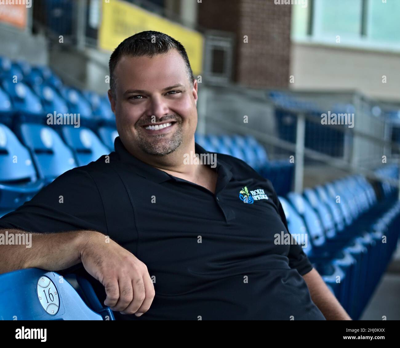 Corporate Photo of Stadium Manager in Baseball Stadium Stock Photo