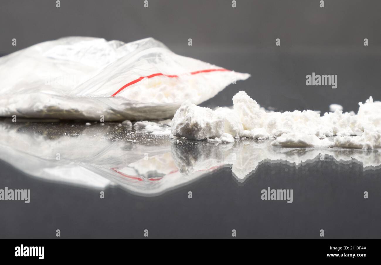 synthetic white crystal drugs, white powder cocaine amphetamine closeup Stock Photo