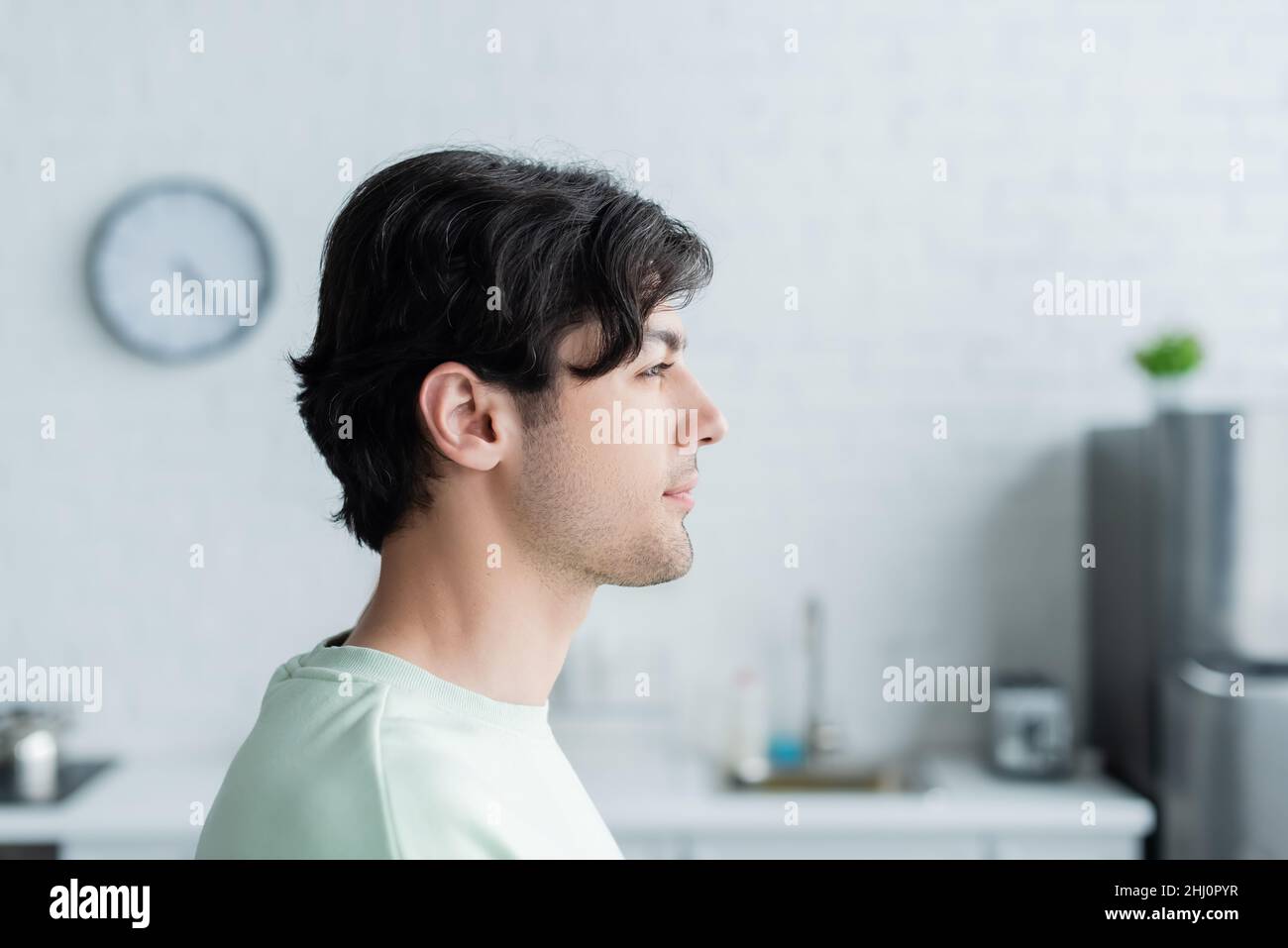 Side view young brunette hi-res stock photography and images - Alamy