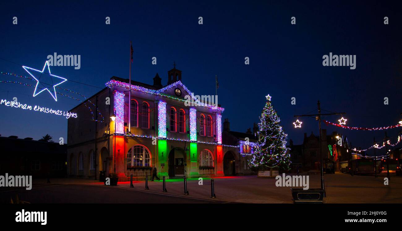 Christmas coloured lights Melksham Townhall Wiltshire England UK Christmas tree town centre copy space market place clear sky night time evening Stock Photo