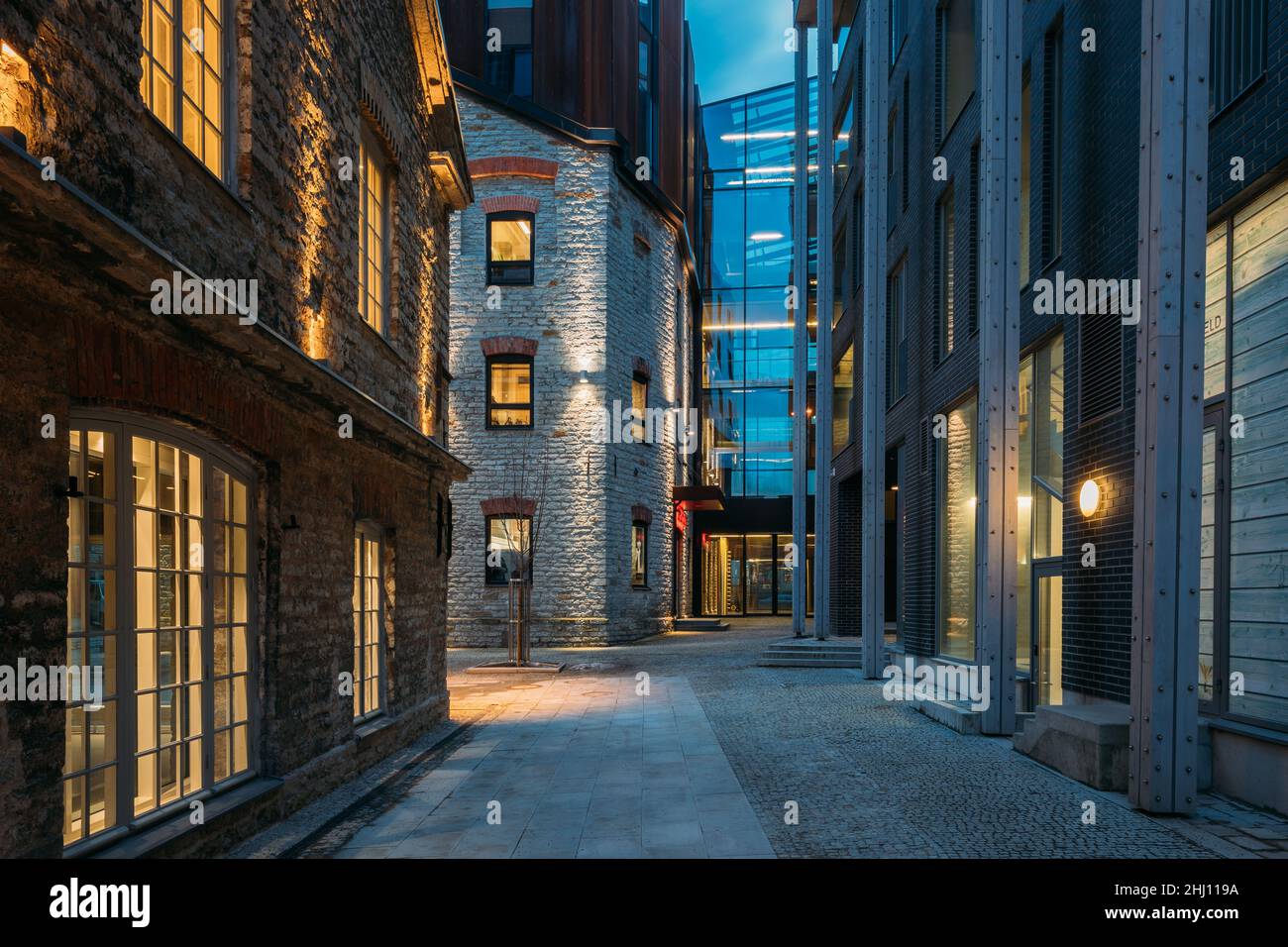 Tallinn, Estonia. View Of Historical Rotermann City In Evening Illuminations. Rotermann Quarter Includes Old Industrial Buildings With New Function Stock Photo