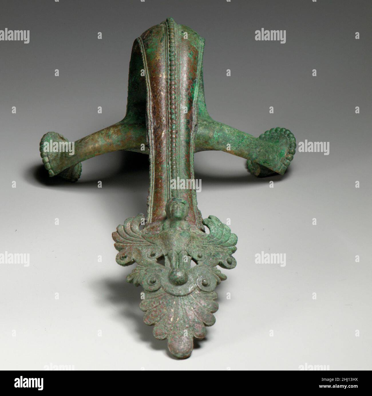 Vertical handle of a bronze hydria (water jar) mid5th century B.C. Greek Above, head and pelt