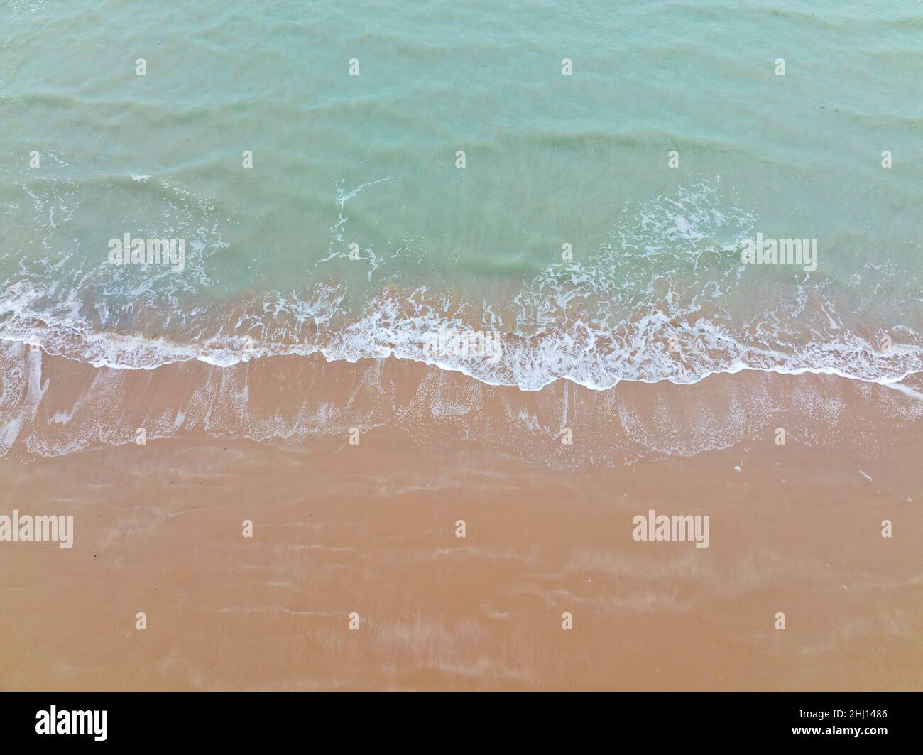 Abstract Waves on the Beach Aerial Photo Stock Photo