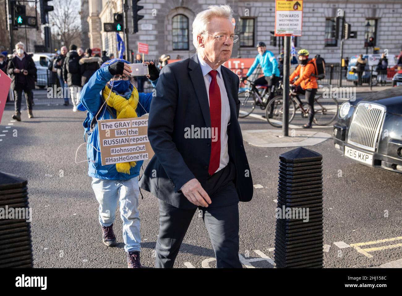 Protesters target Conservative MP David Davis outside Houses of parliament on the day that Boris Johnson faces further demands to resign, London, UK Whitehall, London, England, UK 26th January 2022 Credit: Jeff Gilbert/Alamy Live News Stock Photo