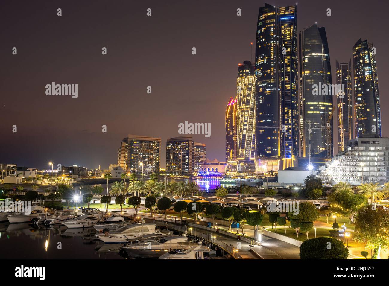 Abu Dhabi Skyline illuminated at night Stock Photo Alamy