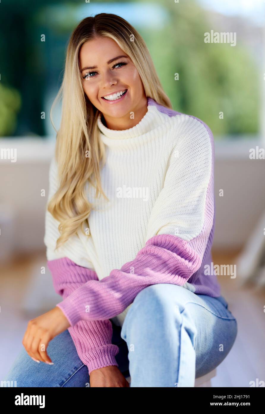 Portrait of smiling blonde woman Stock Photo