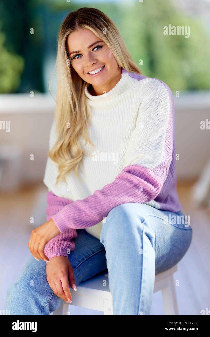 Portrait of smiling blonde woman Stock Photo