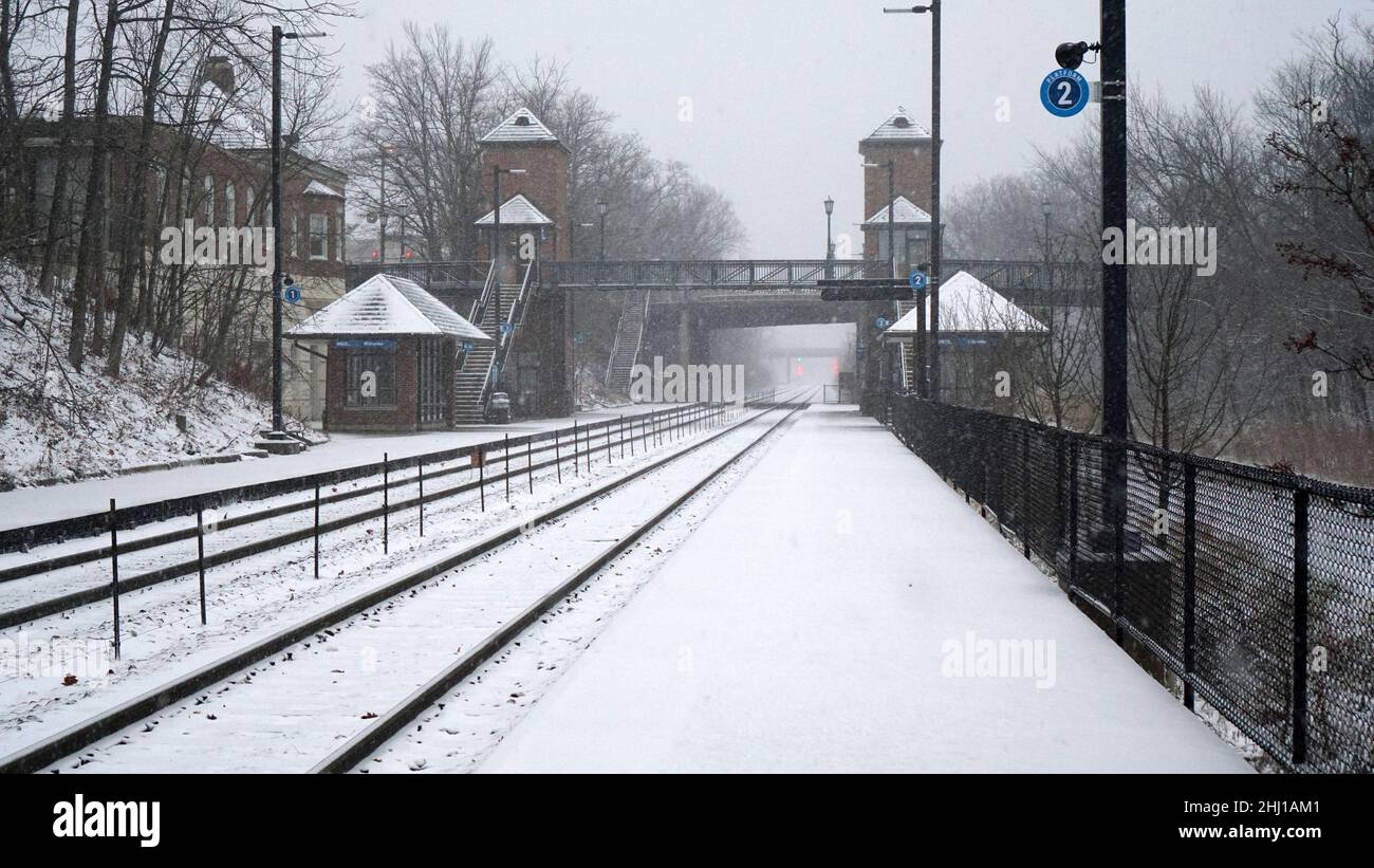 Snowy winter day at Winnetka, Illinois Metra commuter rail train station. Stock Photo