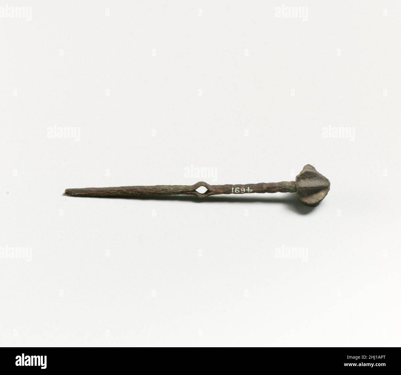 Bronze eyelet-type pin ca. 14th century B.C. Mycenaean 