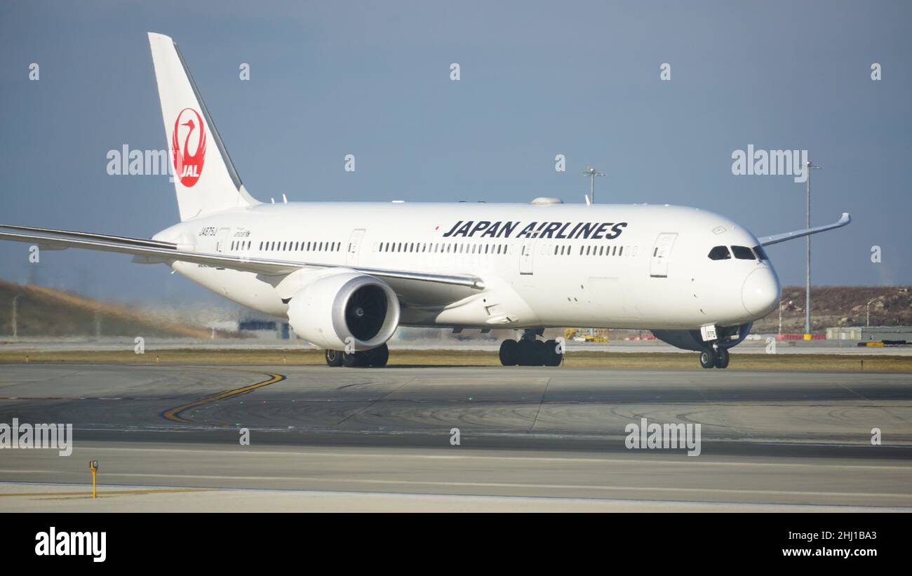 Japan Airlines Boeing 787 Dreamliner taxies on the runway after landing at Chicago O'Hare International Airport. Stock Photo
