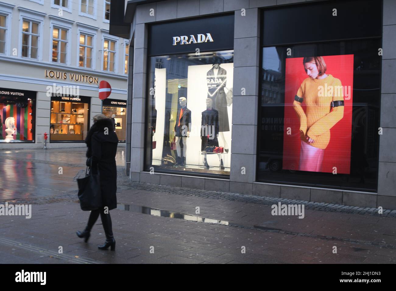Copenhagen/Denmark./26 January 2022/. Visitors and shoppers pass by Prada  store on stroeget in danish capital Copenhagen Denmark. (Photo..Francis  Dean/Dean Pictures Stock Photo - Alamy