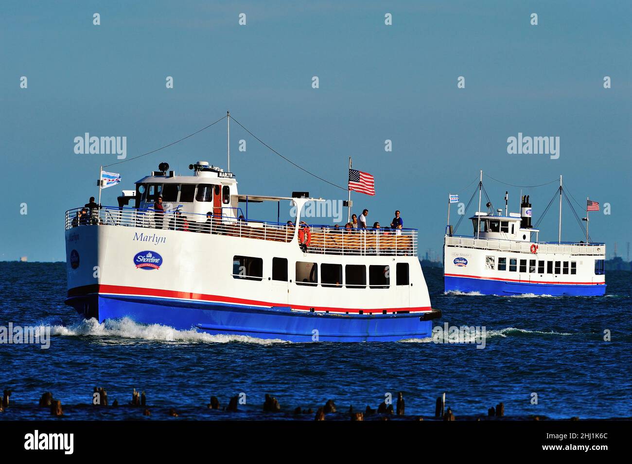 Chicago, Illinois, USA. A pair of water taxis doubling as a tour boats