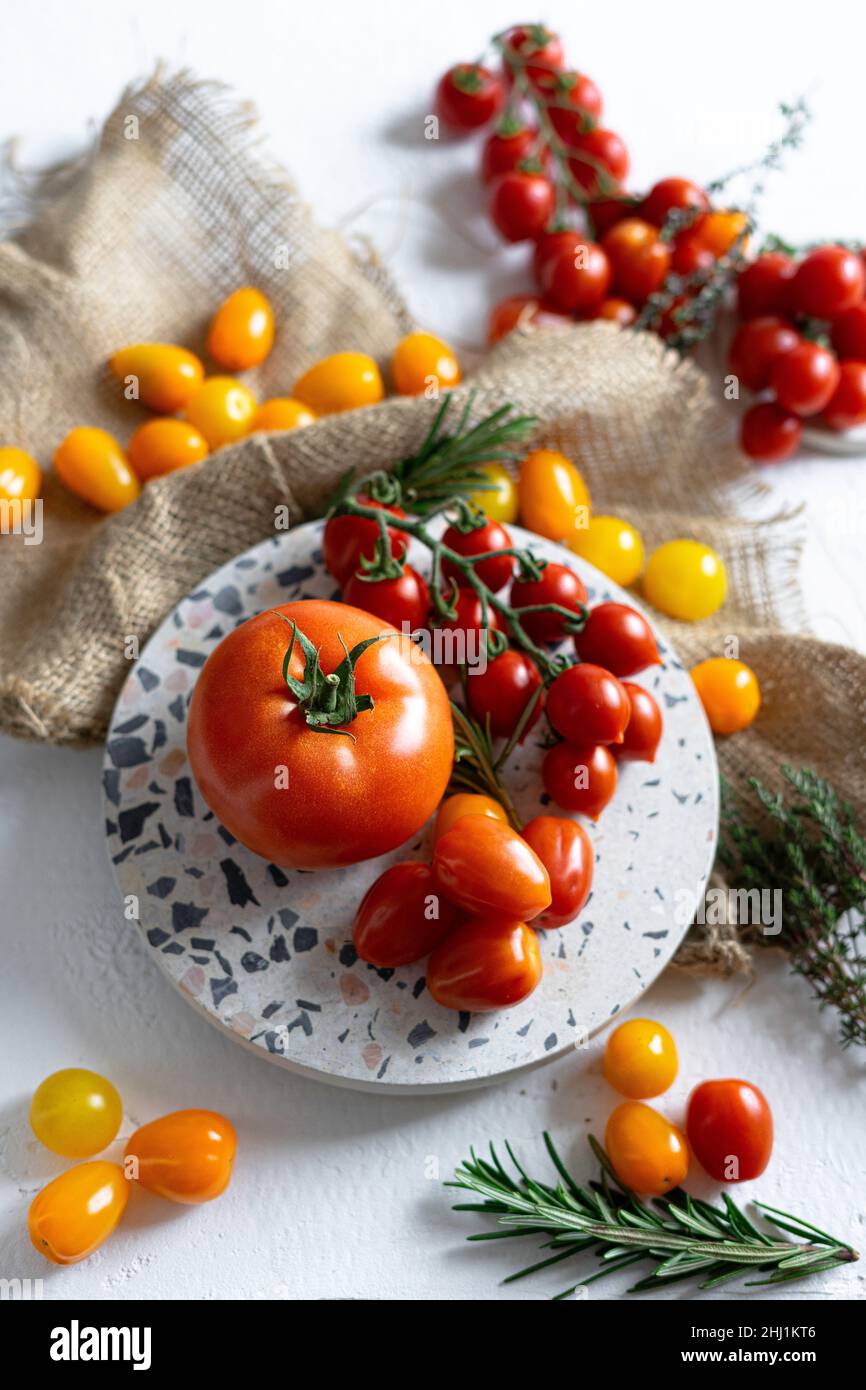 Lots of colorful tomatoes of different sizes Stock Photo