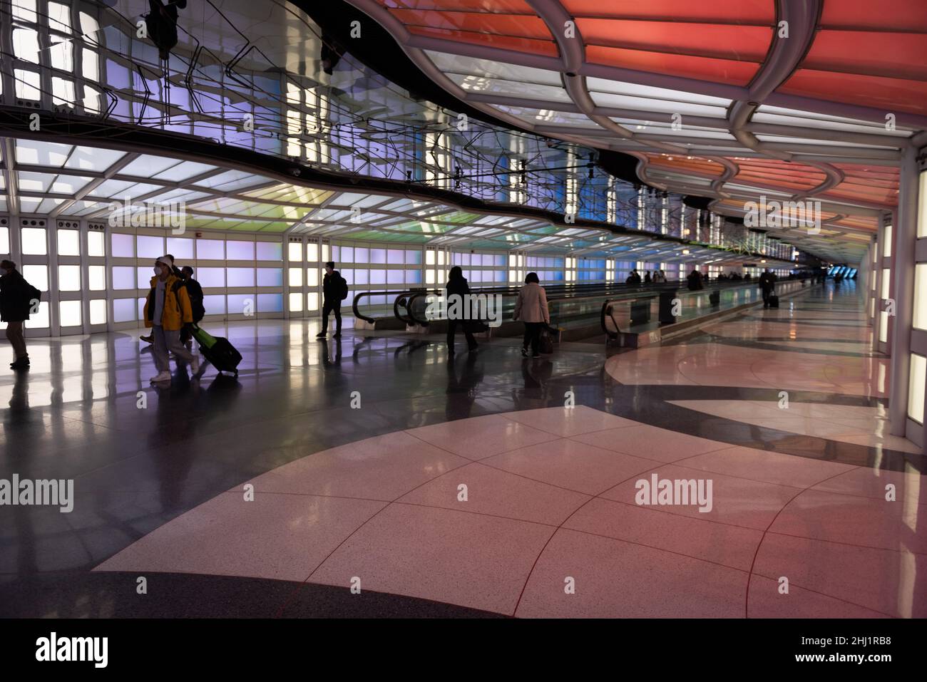 Air passengers, business people walking, colourful neon lights art