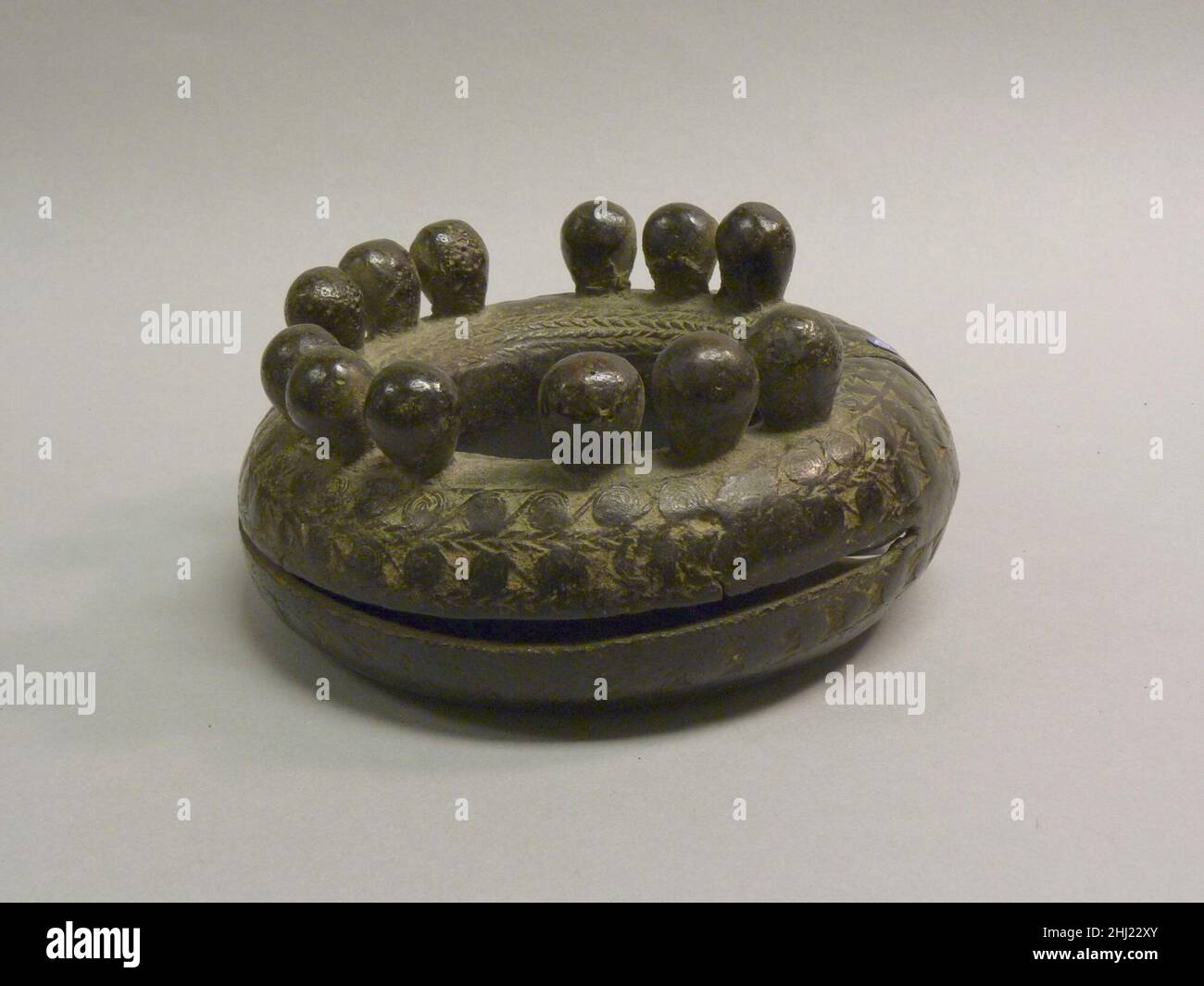 Anklet with Spheres on Top 500 B.C.–A.D. 300 Vietnam. Anklet with Spheres on Top  53356 Vietnam, Anklet with Spheres on Top, 500 B.C.?A.D. 300, Bronze, H. 3 in. (7.6 cm); Diam. 6 1/4 in. (15.9 cm). The Metropolitan Museum of Art, New York. Samuel Eilenberg Collection, Bequest of Samuel Eilenberg, 1998 (2001.433.321) Stock Photo