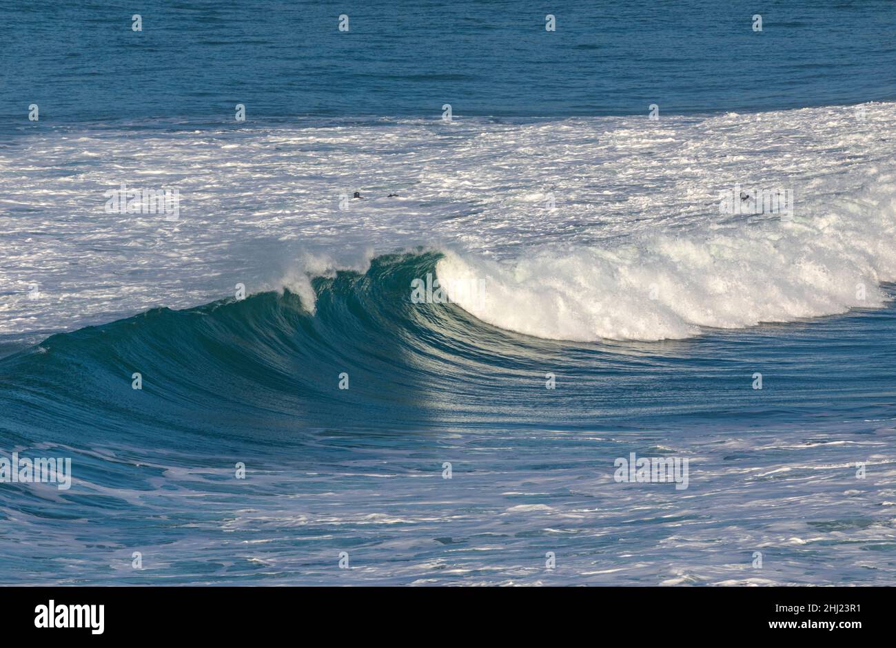 Big waves off the shore at Holywell Bay North Cornwall Stock Photo