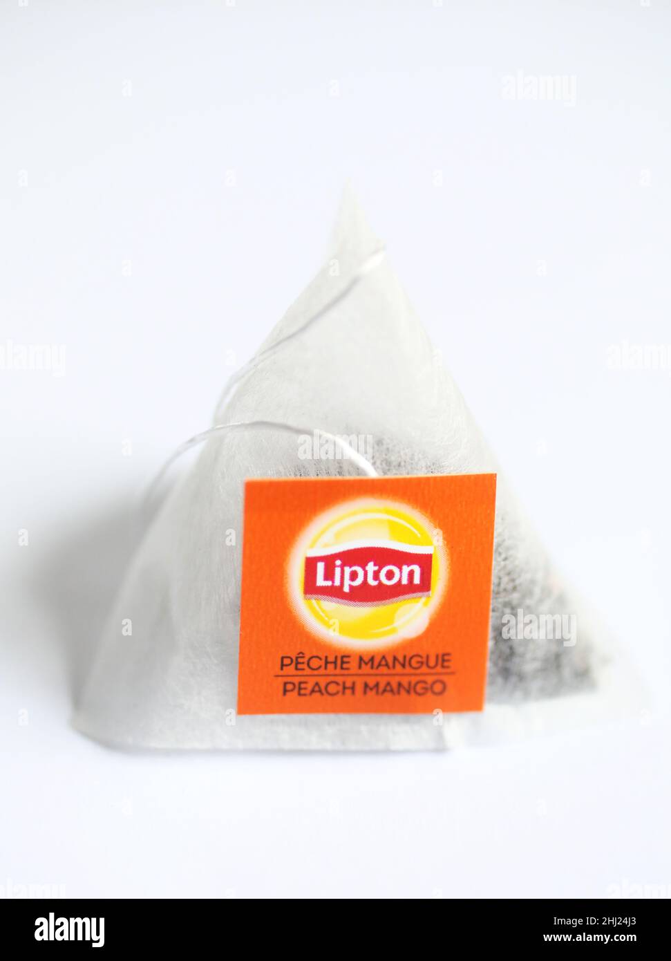 A Lipton tea bag. Lipton is a British brand of tea, owned by Unilever