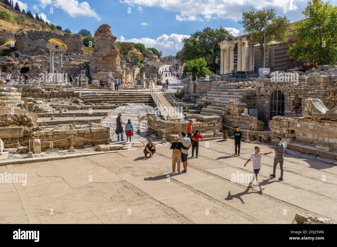 Domestic and foreign tourists among the ruins of the ancient city of ...