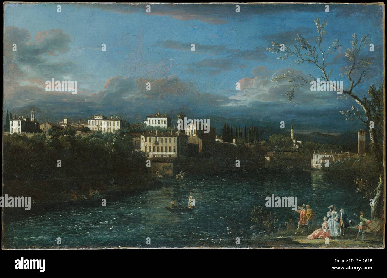 Vaprio d'Adda 1744 Bernardo Bellotto Italian By carefully staging the sunlight hitting the facades rising above the Adda River, Bellotto picks out the village of Canonica d'Adda at the right and Vaprio at the center. Located northeast of Milan, Vaprio was the site of Villa Melzi, where Leonardo da Vinci visited his pupil Francesco Melzi. On related drawings, Bellotto noted that this painting and its pendant were made in 1744 for Count Simonetta in Milan. The pendant, now in the Museo di Capodimonte, Naples, depicts the landscape from the opposite direction.. Vaprio d'Adda. Bernardo Bellotto (I Stock Photo