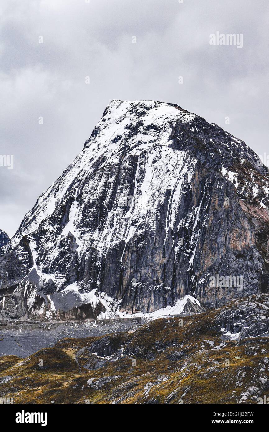 A snowy peak in Peruvian Andes mountain range Stock Photo
