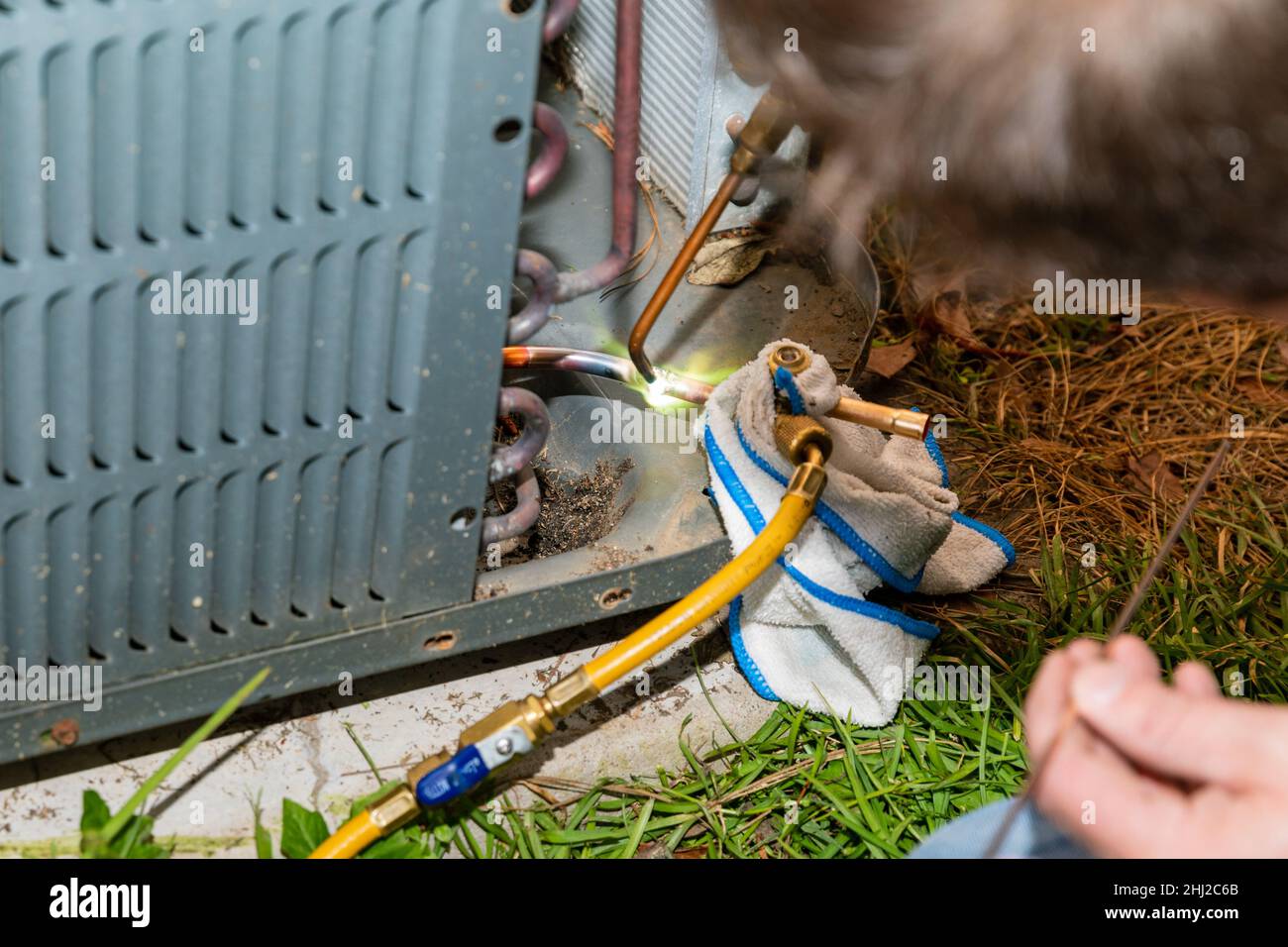 Air Conditioner Technician using a brazing torch to repair equipment Stock Photo Alamy