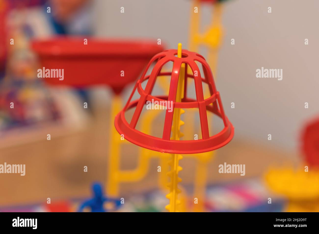 https://c8.alamy.com/comp/2HJ2D9T/a-close-up-view-of-the-red-basket-balanced-on-the-yellow-pole-of-the-mouse-trap-2HJ2D9T.jpg