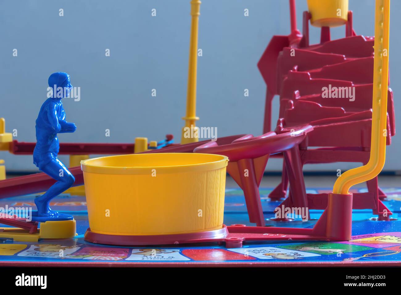 Close up image of the Diver on Mouse Trap Board Game ready to dive into the yellow Pool which sets of the mouse trap. Stock Photo