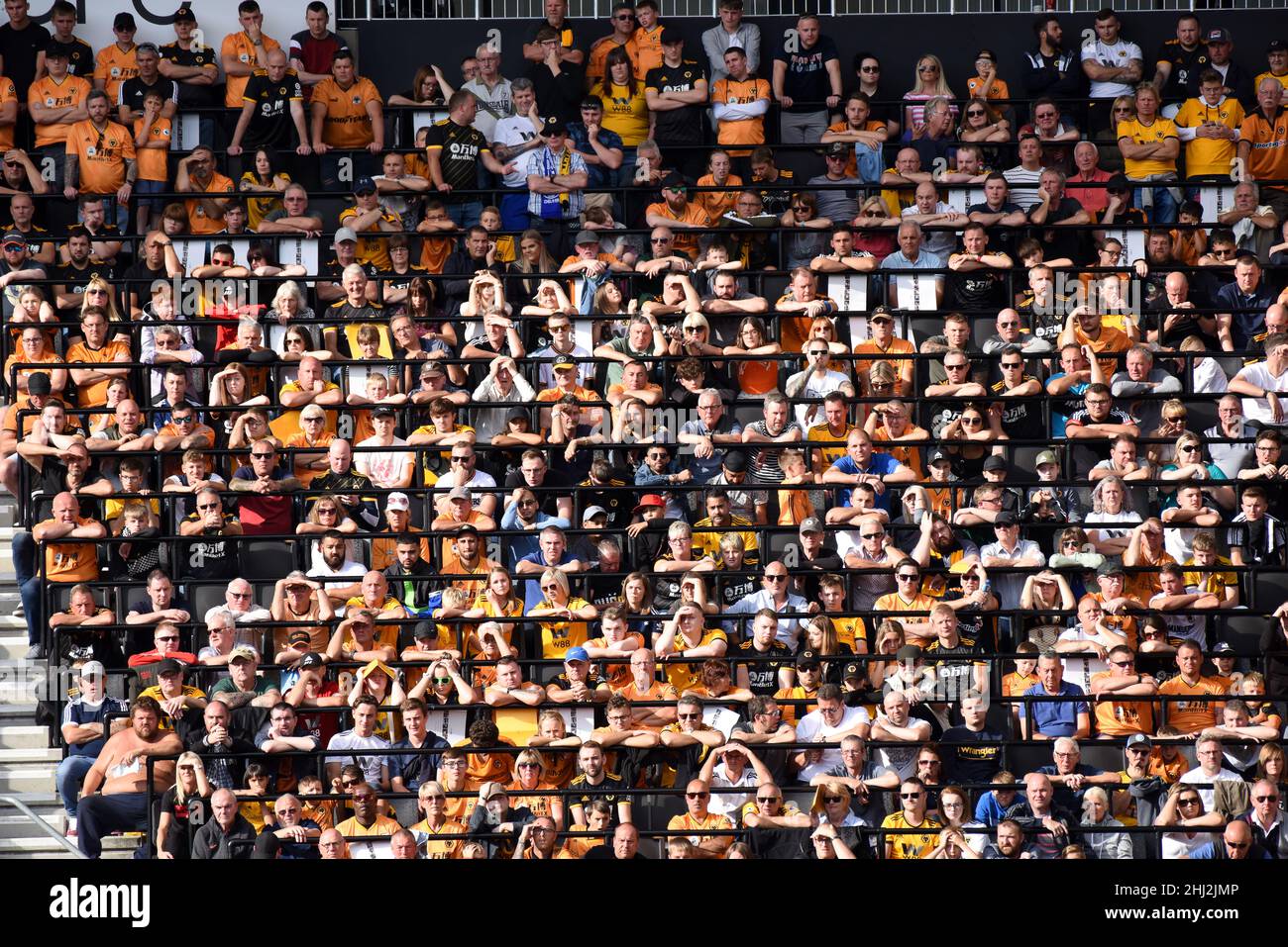 Wolves football supporters fans using safe standing Rail seats Wolverhampton Wanderer v Chelsea at Molineux Stadium 14/09/2019 Stock Photo