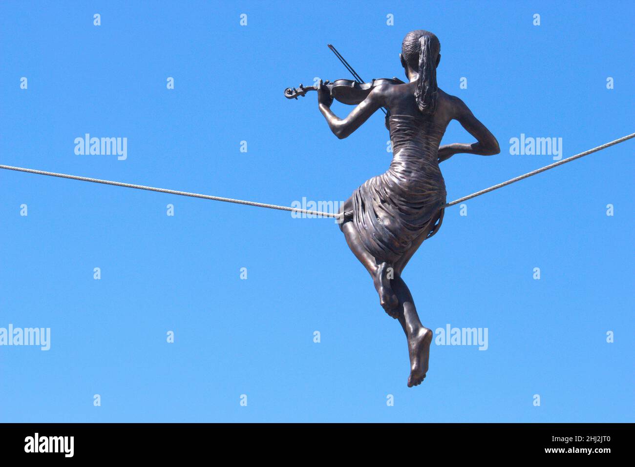 Cherkasy / Ukraine : flying bronze statue of a violinist girl Stock Photo