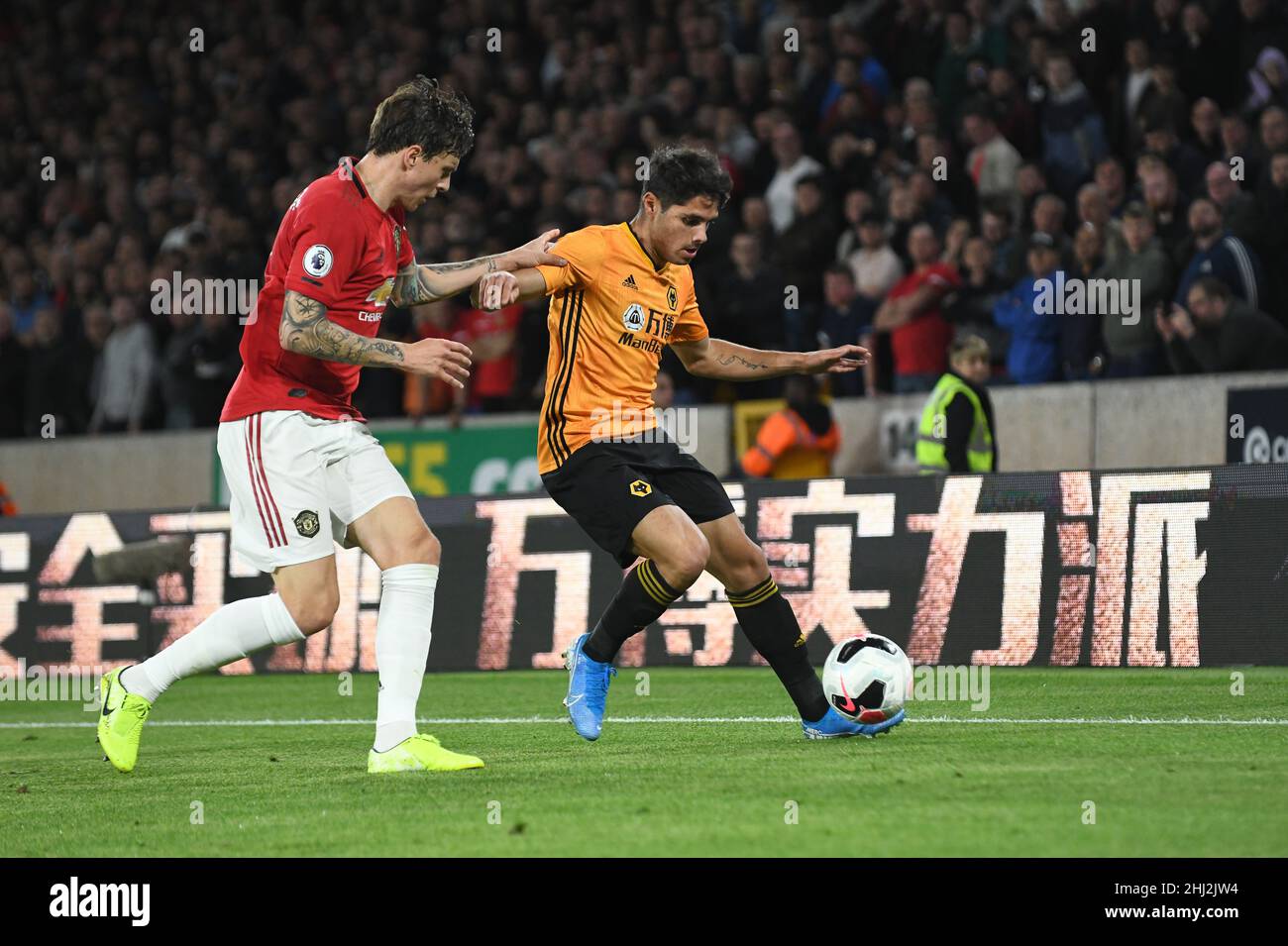 Wolves footballer Pedro Neto and Victor Lindelöf  Wolverhampton Wanderers v Manchester United at Molineux Stadium 19/08/2019 Stock Photo