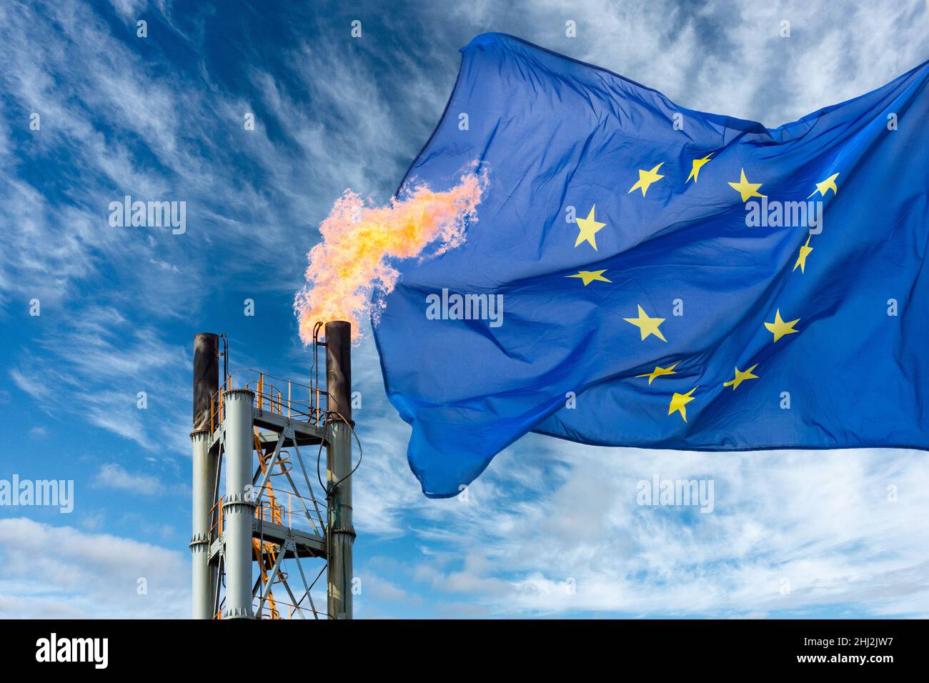 Industrial gas flare chimney with EU flag. Europe, European gas supply, gas prices, Russia Ukraine conflict, fossil fuels... concept Stock Photo