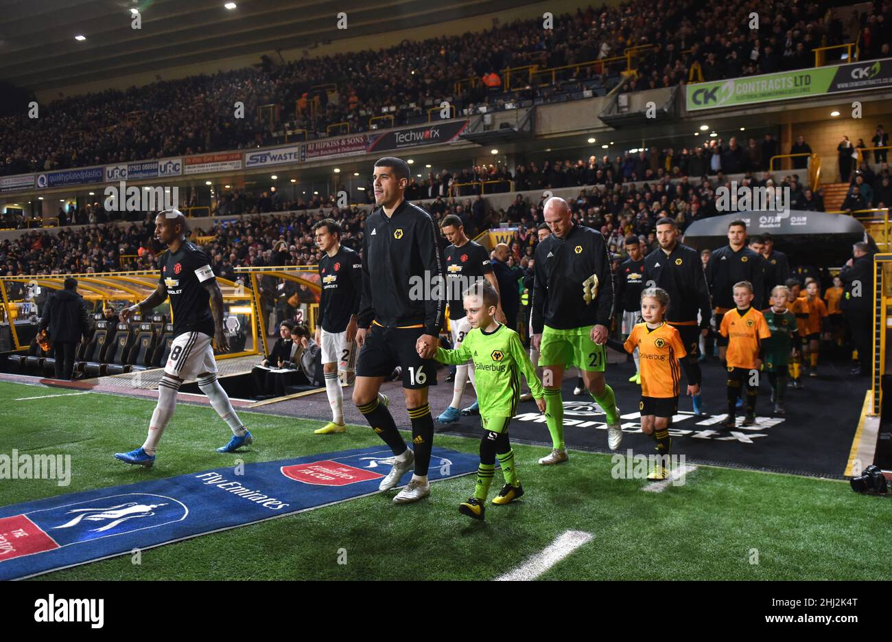 Wolves captain Conor Coady leading out the team Wolverhampton Wanderers v Manchester United at Molineux Stadium  in Emirates FA Cup  04/01/2020 Stock Photo