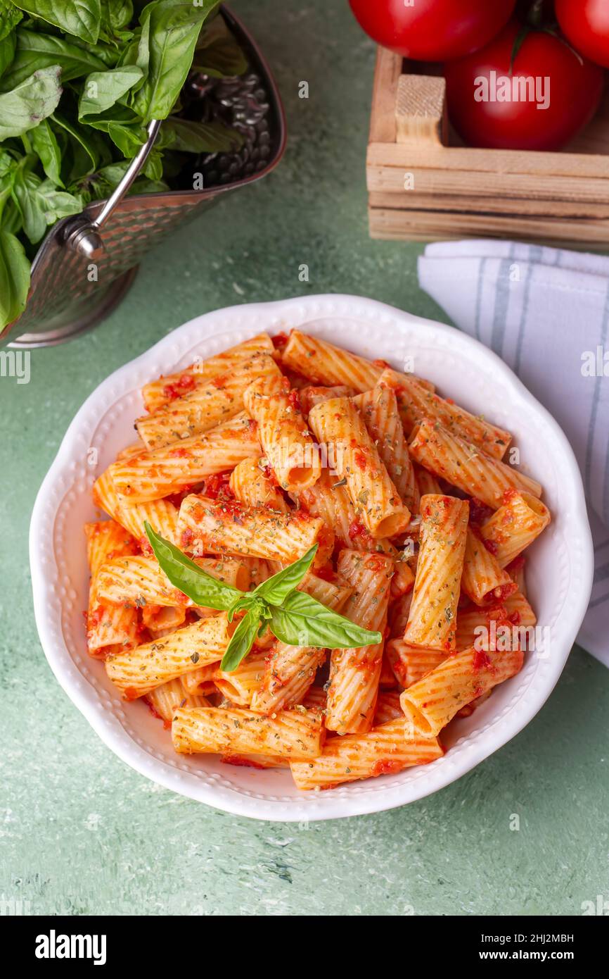 Penne pasta with tomato sauce Stock Photo - Alamy