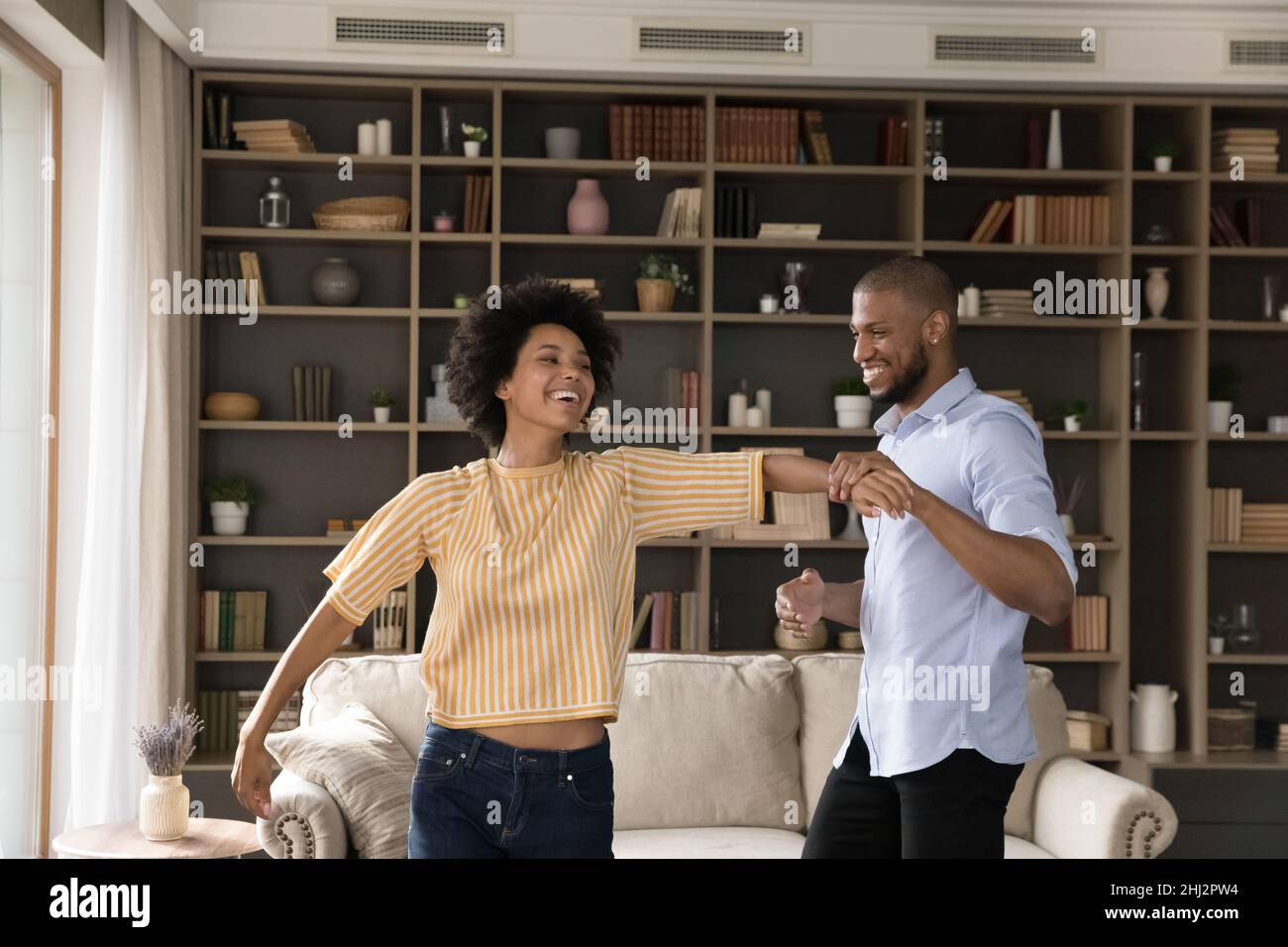 Two african woman dancing hi-res stock photography and images - Alamy