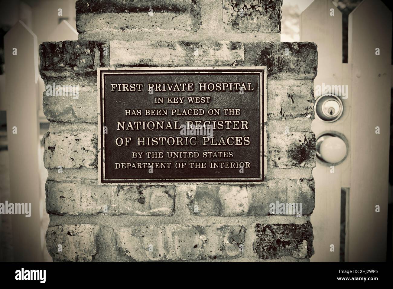 Plaque at entrance to First private hospital in Key West, Florida, FL, USA.  The hospital has been placed on the National Register of Historic Places Stock Photo