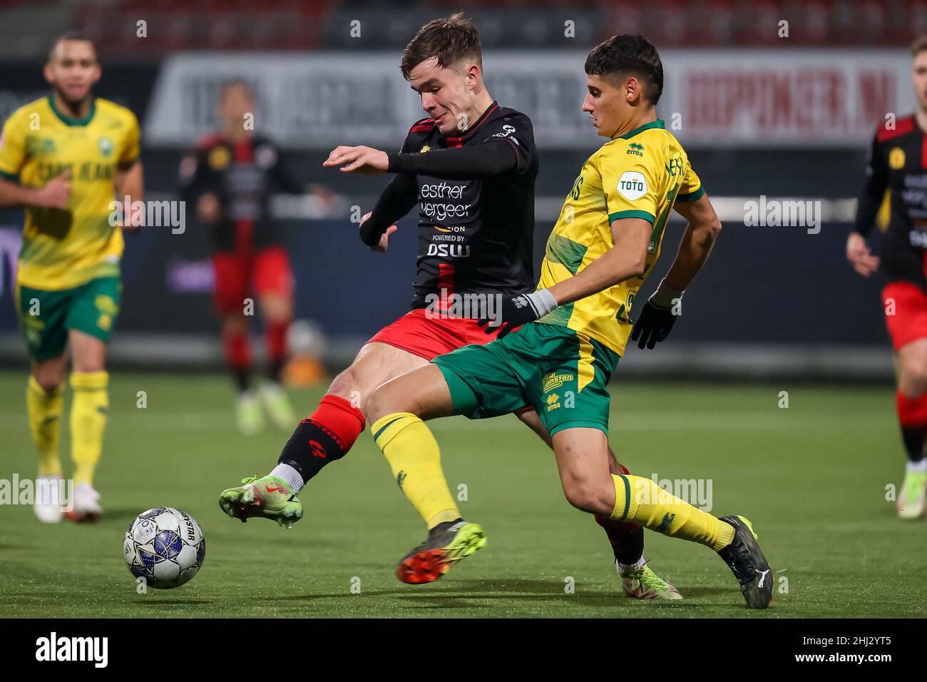 ROTTERDAM, NETHERLANDS - JANUARY 25: Thijs Dallinga of Excelsior and Michael Mulder of ADO Den Haag during the Dutch Keukenkampioendivisie match between Excelsior and ADO Den Haag at Van Donge & De Roo Stadion on January 25, 2022 in Rotterdam, Netherlands (Photo by Herman Dingler/Orange Pictures) Stock Photo