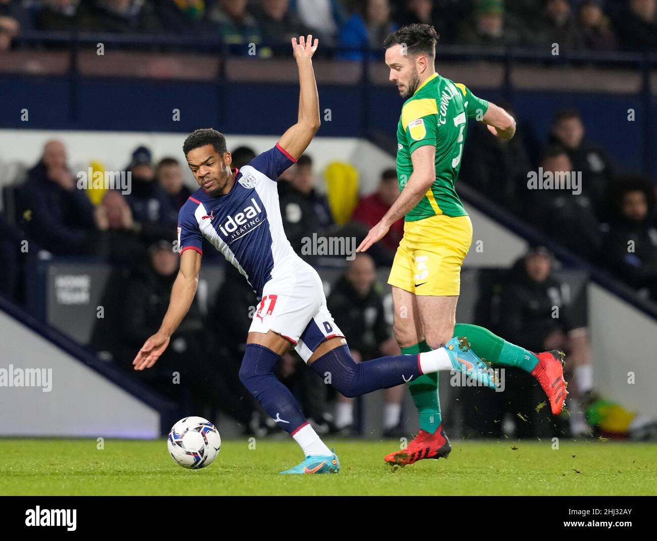 West Bromwich, England, 26th January 2022.   Grady Diangana of West Bromwich Albion tackled by Greg Cunningham of Preston North End during the Sky Bet Championship match at The Hawthorns, West Bromwich. Picture credit should read: Andrew Yates / Sportimage Credit: Sportimage/Alamy Live News Stock Photo