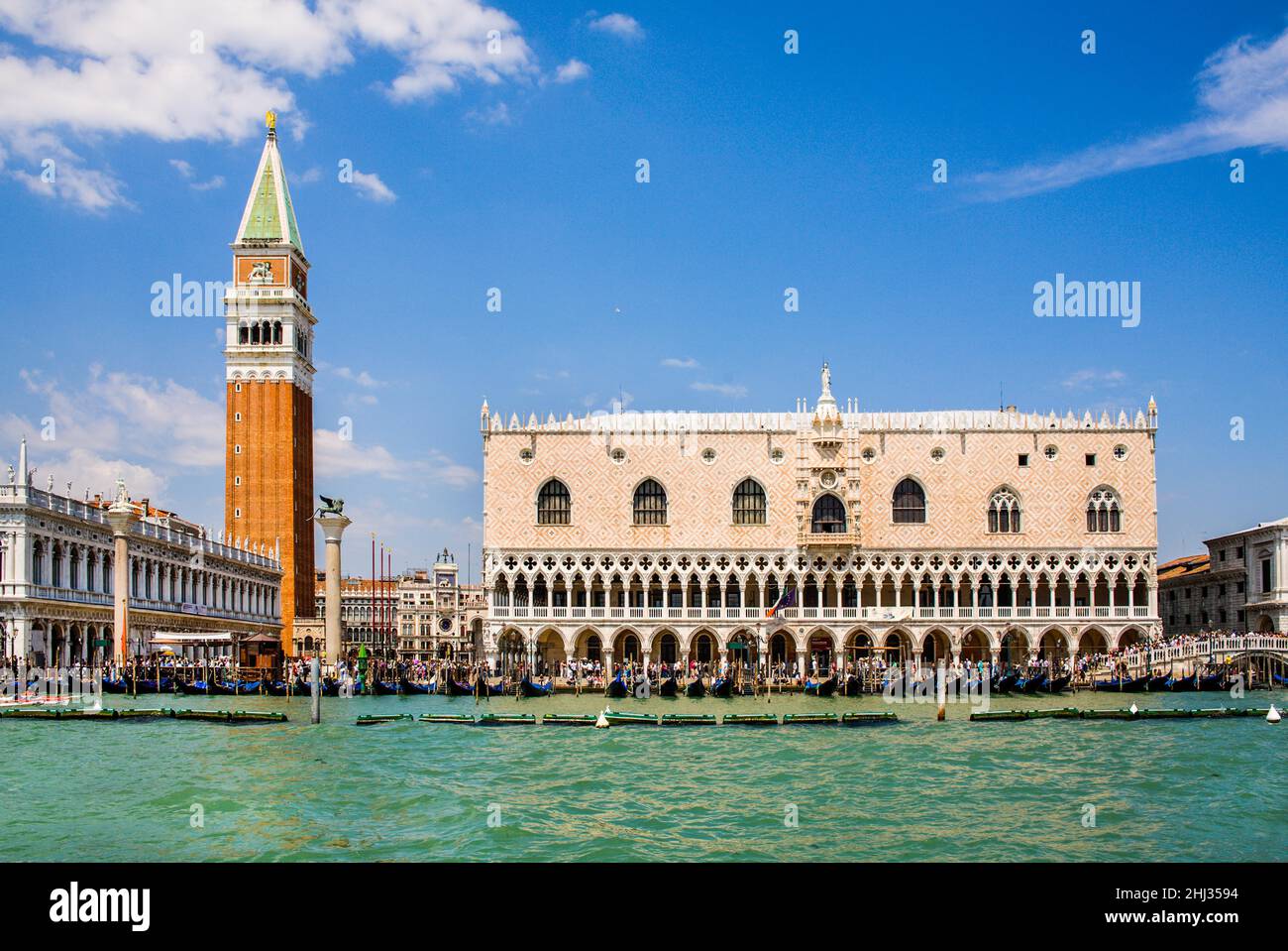 Campanile and Doge's Palace with rows of arcades. Palazzo Ducale, centre of power in Venice, most important secular Gothic building, lagoon city Stock Photo