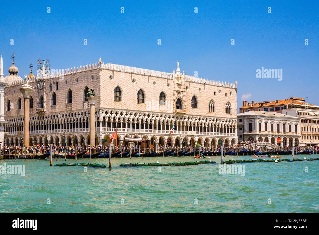 Doge's Palace with rows of arcades. Palazzo Ducale, centre of power in Venice, most important secular Gothic building, lagoon city, Veneto, Italy Stock Photo