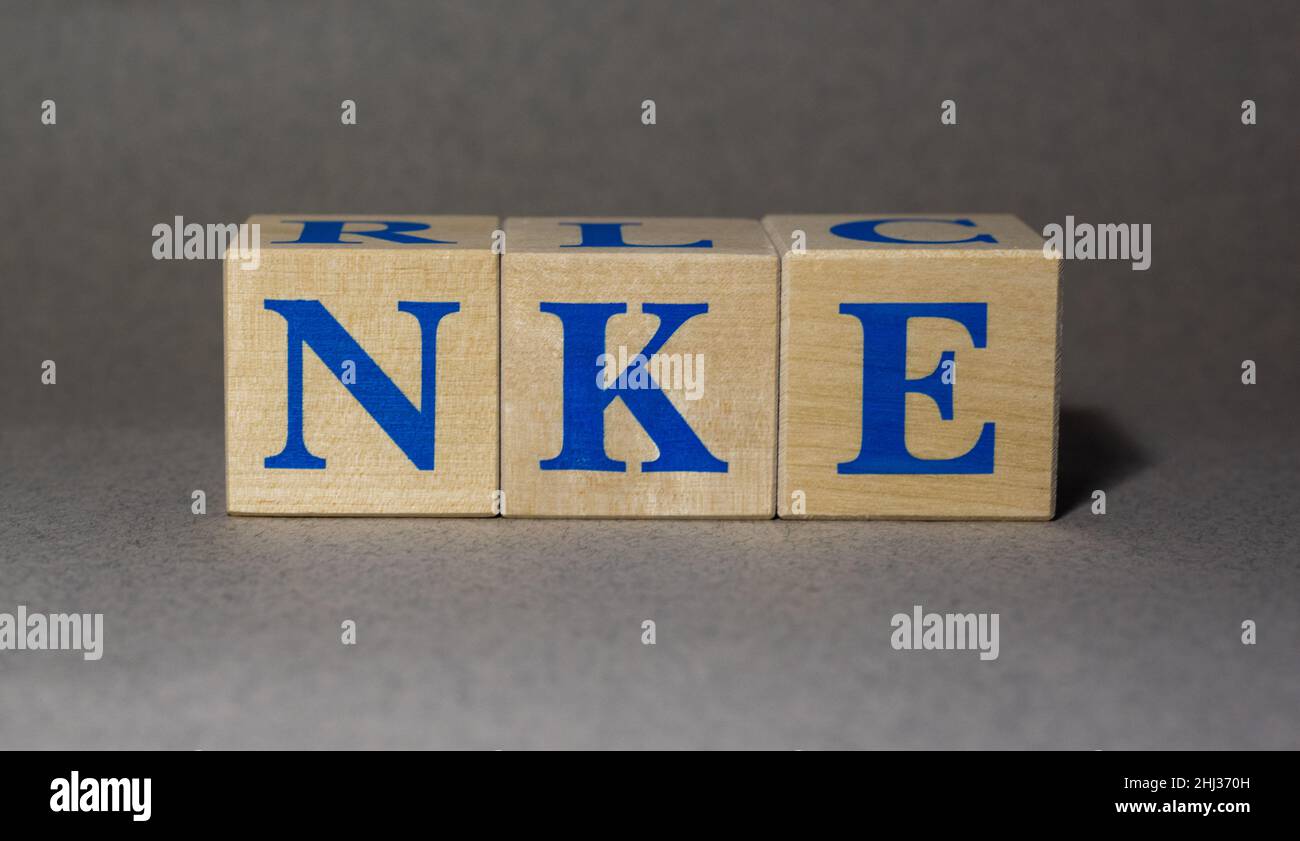 January 19, 2022. York, USA. The Stock Ticker symbol of the NIKE NKE company, made of wooden cubes, on a gray background Stock Photo - Alamy